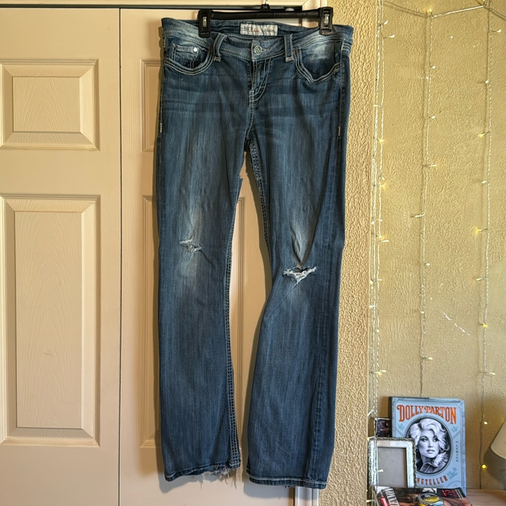 BKE ADDISON JEANS SIZE 32 DAMAGED ON BOTTOM OF BELL BOTTOMS ND HOLES IN INNER TH